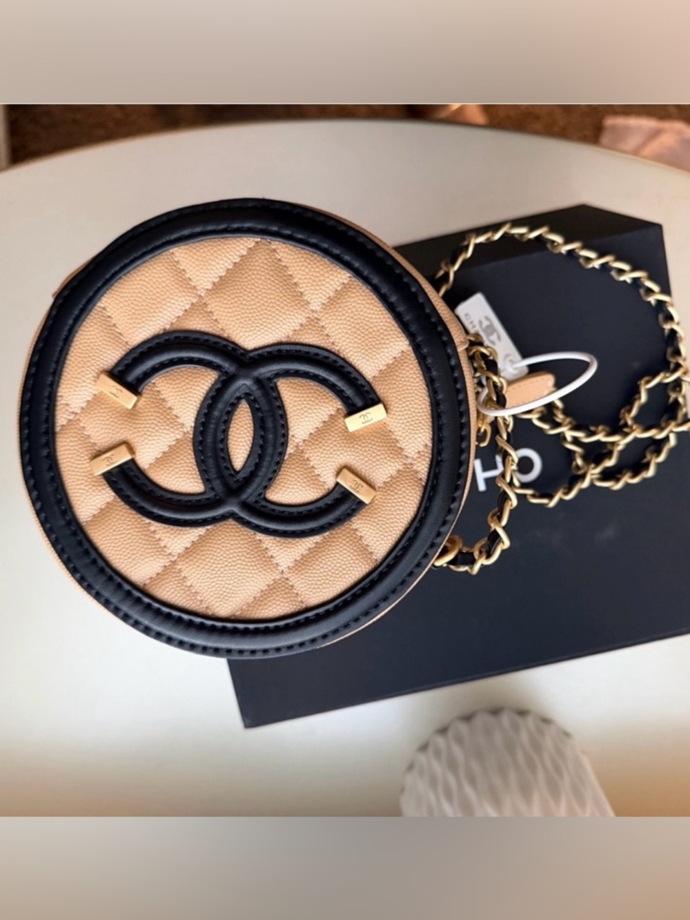 Quilted Round Crossbody Bag in Beige and Black